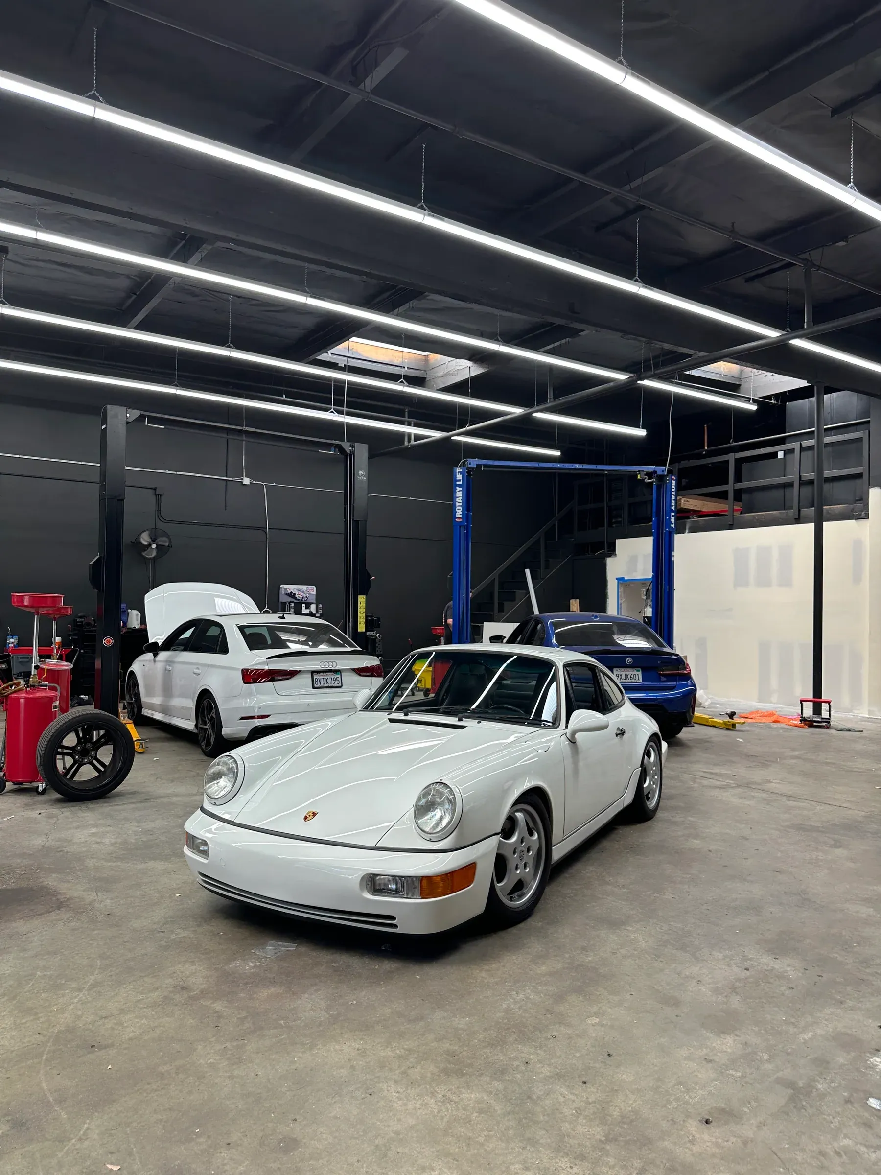 White classic Porsche 911 photographed in the Speedhaus workshop