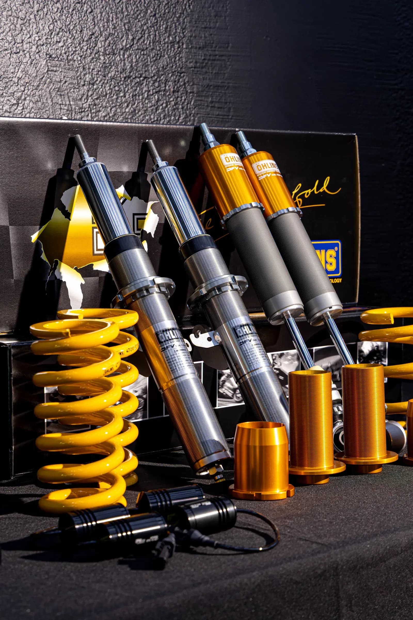 Öhlins suspension components prepared for a performance vehicle