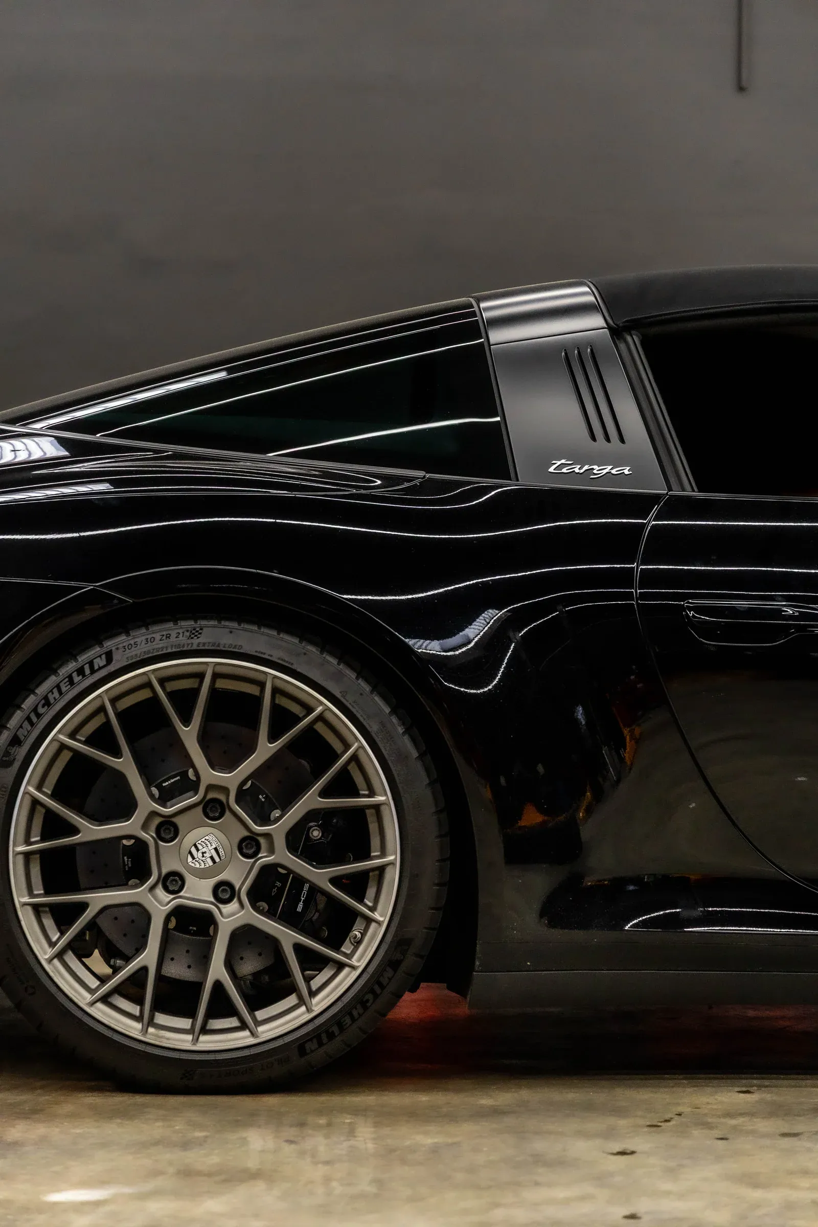Porsche 911 Targa wheel and roof detail inside the Speedhaus workshop
